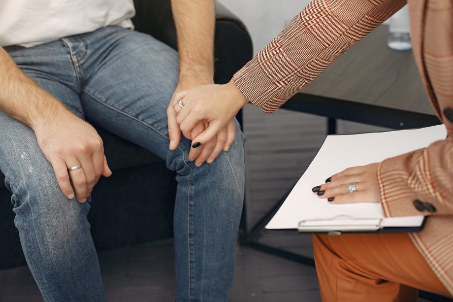 In the psychologist's office. Man and woman talking